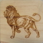 A picture of an animal that is carved into wood.